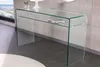 A clear glass console table with a shelf, placed in a modern interior setting. Produktbild-Vorschau