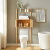 A bathroom scene with a toilet and an over-the-toilet storage shelf. Produktbild-Vorschau