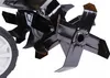A close-up view of the tines and wheel of a garden tiller. Náhľad obrázku produktu