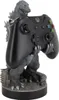 A Godzilla figurine holding an Xbox controller. Produktbild-Vorschau