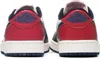 The rear view of a pair of Nike Air Jordan 1 Retro Low sneakers. Voir les images du produit