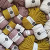 A collection of Bobbiny macrame cords in various colors and sizes, neatly arranged. Podgląd zdjęcia produktu