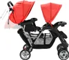 A red and black tandem stroller shown from the side against a white background. Náhled obrázku produktu