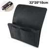 A dark gray felt bed organizer with multiple pockets, shown from a slightly elevated diagonal angle. Produktbild-Vorschau