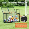 A black metal ball cart filled with various sports balls, placed on a grassy field next to a soccer goal. Anteprima dell’immagine prodotto