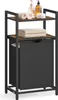 A laundry basket with shelves and towels on a white background. Produktbild-Vorschau