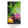 A decorative panel with a spa-themed image of bamboo, stones, a candle, and an orchid, with electrical components at the bottom. Produktbild-Vorschau