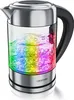 A close-up shot of a modern electric kettle with a glass body, filled with water and illuminated by colorful LEDs, sitting on a white surface. Podgląd zdjęcia produktu