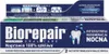 A box of Biorepair toothpaste with marketing graphics and text. Podgląd zdjęcia produktu