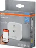 The image shows the retail packaging of an OSRAM SMART+ CO Detector, with a smartphone displaying the OSRAM SMART+ app and Google Home app. Produktbild-Vorschau