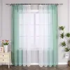 A window with sheer curtains, a bedside table with flowers and a picture, and a plant. Produktbild-Vorschau
