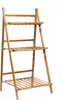 A three-tiered wooden plant stand. Produktbild-Vorschau