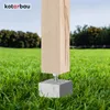A wooden post is mounted on a concrete base in a grassy yard. Produktbild-Vorschau