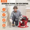 A man is using a pipe cleaning machine in a bathroom. Podgląd zdjęcia produktu
