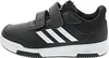 A side view of a black Adidas shoe with white stripes and velcro straps. Podgląd zdjęcia produktu