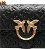 A close-up shot of a black leather handbag with embossed patterns and gold bird embellishments. Náhled obrázku produktu