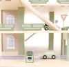 A toy garage with cars and a gas pump. Produktbild-Vorschau