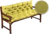 A tufted green cushion on a wooden bench. Produktbild-Vorschau