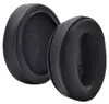 Two black ear pads for headphones are shown against a white background. Voir les images du produit