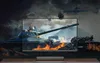 A television screen displaying a war scene with a tank and explosions, with a soundbar in front of it. Podgląd zdjęcia produktu