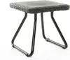 A black wicker-style side table with a dark gray top and black metal legs, shown against a white background. Náhľad obrázku produktu
