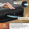 Close-up of an inflatable mattress with a person's feet visible, highlighting its features and benefits. Podgląd zdjęcia produktu