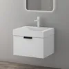 A modern white vanity with a sink and faucet is mounted on a gray wall. Anteprima dell’immagine prodotto