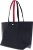 A dark blue tote bag with red accents and a white Lacoste logo. Anteprima dell’immagine prodotto