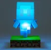 A glowing blue Minecraft Allay figurine on a pixelated grass block base. Anteprima dell’immagine prodotto