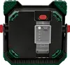 The back of a black work light with green protective corners and a red power button. Produktbild-Vorschau