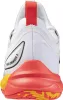The back view of a white athletic shoe with red and yellow accents on the sole. Produktbild-Vorschau