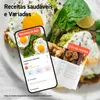 A collage of food and a smartphone displaying a recipe app, alongside an open cookbook. The background is a plate of food, likely avocado toast with eggs. Náhľad obrázku produktu