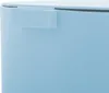 A close-up view of the top corner of a light blue trash can, showing a part of the lid and a clip mechanism. Náhľad obrázku produktu