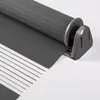 A close-up view of a roller blind mechanism and fabric. Produktbild-Vorschau