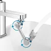 A close-up view of a chrome faucet attachment with a flexible hose, positioned over a white sink. Produktbild-Vorschau