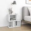 A white bedside table with books and a vase of flowers next to a bed. Náhľad obrázku produktu