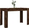A wooden dining table with two cups and a vase of flowers on top, set against a white background. Produktbild-Vorschau
