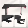 A close-up view of a black gaming desk, highlighting its features with red lines and inset images. Podgląd zdjęcia produktu