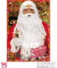 A man dressed as Santa Claus, holding a bell, with a festive background. Produktbild-Vorschau