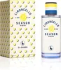 A product shot of a perfume bottle and its box, both featuring a lemon-themed design. Podgląd zdjęcia produktu