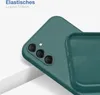 Close-up of a green phone case, showing the camera cutout and the interior texture. Produktbild-Vorschau