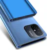 A close-up, angled view of a blue smartphone case, showing the camera cutout and the brand name. Produktbild-Vorschau