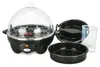 A black and clear egg cooker with accessories on a white background. Náhľad obrázku produktu