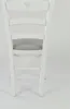 The back view of a white wooden chair with a grey upholstered seat. Voir les images du produit