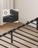 Close-up view of a black metal bed frame with a magnified inset showing a detail of how the parts connect. Náhled obrázku produktu