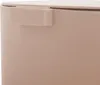 A close-up view of the top edge of a beige trash can, showing a part of the lid and a small handle or latch. Anteprima dell’immagine prodotto