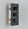 A black thermostatic shower control panel with three knobs, partially installed on a wall with its internal white mounting box visible. Anteprima dell’immagine prodotto