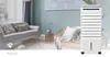 A mobile air cooler is shown in a modern living room setting, next to a chair and a sofa. Produktbild-Vorschau