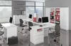 A modern office space with multiple workstations and a large filing cabinet. Podgląd zdjęcia produktu
