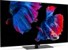 A television screen displaying a vibrant image of two betta fish against a black background. Produktbild-Vorschau